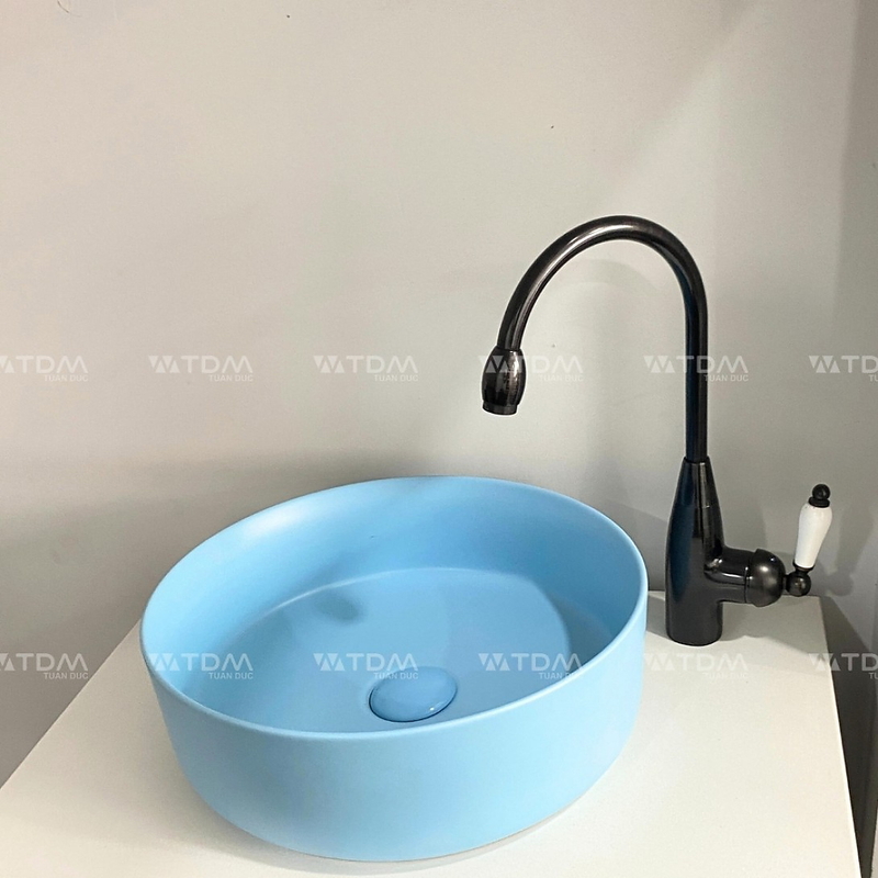 Chậu lavabo đặt bàn sứ tròn màu xanh da trời Kanly SU525