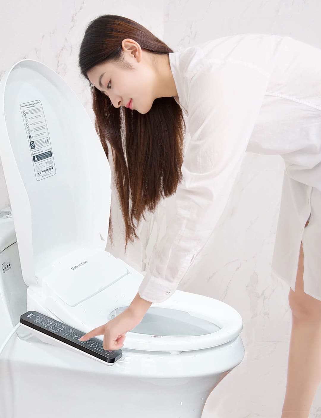 nắp bồn cầu điện tử Inax